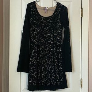 Black/nude lace pattern mini dress. Long sleeves